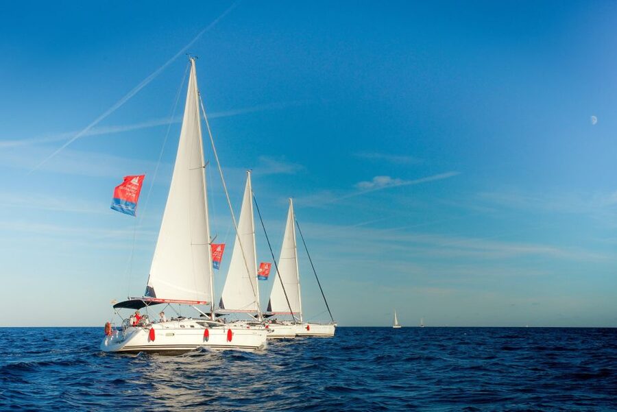 Barcelona: Escape Room Experience and Sailing Cruise - Languages, timing, and cancellation details