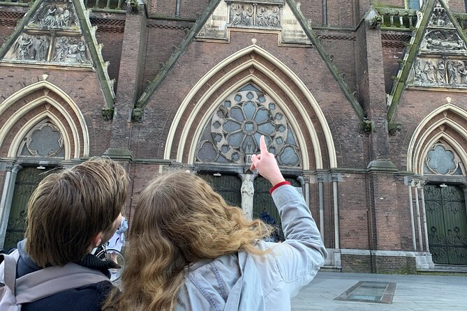 Discover Alkmaar with a self-guided Outside Escape city game tour - Reading Alkmaar’s story at Waagplein