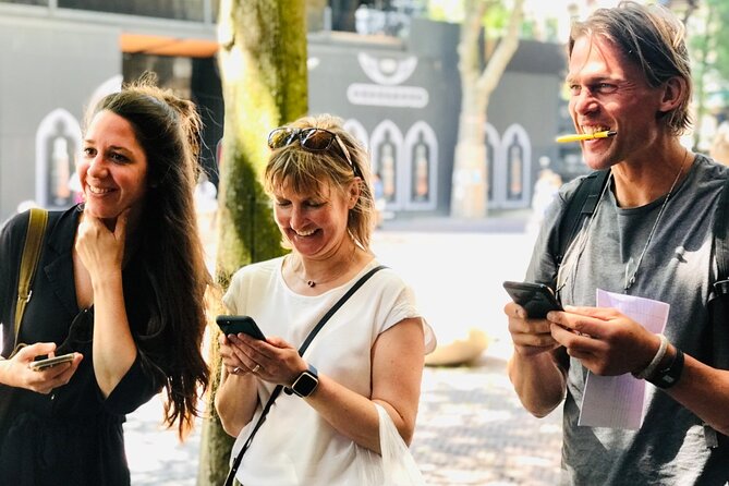 Discover Bruges with a self-guided Outside Escape city game tour! - Walplein mixes cobbles, cafés, and a curious sculpture