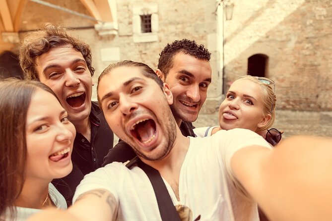 Milan Treasure Hunt for Groups of Friends, Team Building & Company Incentives - Whispering secrets in Piazza Mercanti