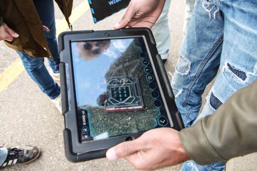 Outdoor Escape Game with Augmented Reality trough Zurich - The puzzles, timing, and group experience