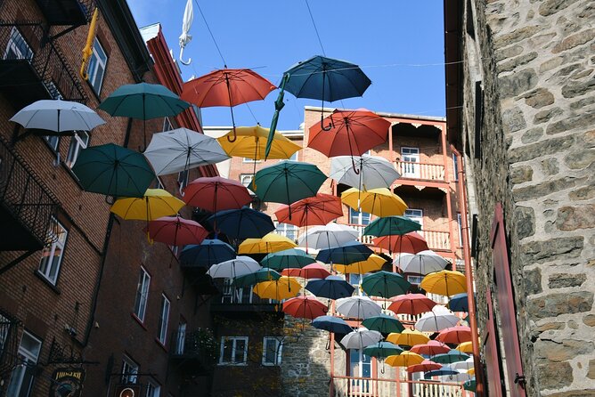 Quebec City Scavenger Hunt and City Highlights Walking Tour - Petit-Champlain and its painted history