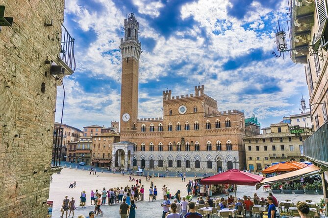 Siena Scavenger Hunt and Highlights Self Guided Audio Tour - Facciatone and the Battistero di San Giovanni